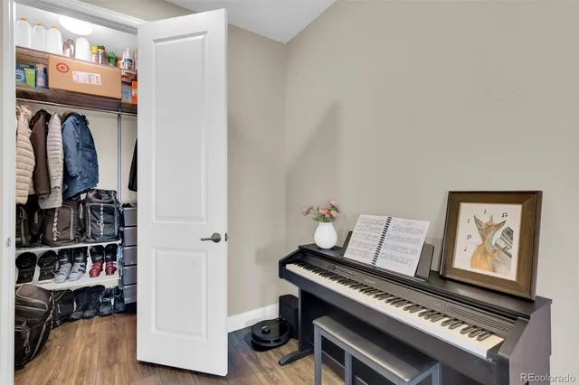 a view of an entryway with wooden floor