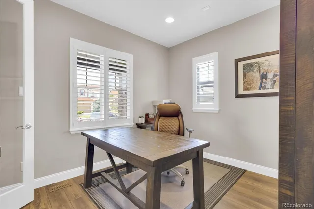 a view of a workspace with furniture