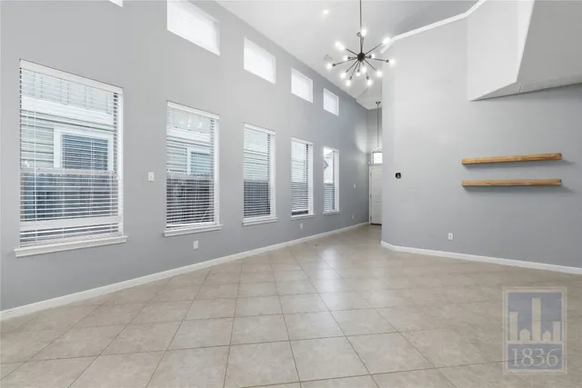 a view of a kitchen with a sink and cabinets