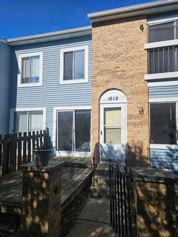 a view of house with outdoor space