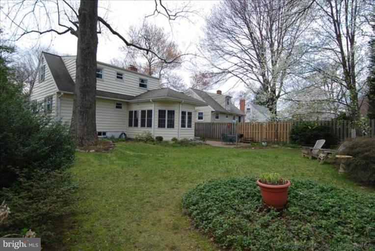 10403 Procter Street Silver Spring, MD 20901 - Photo 2 of 11 a view of a house with backyard sitting area and garden