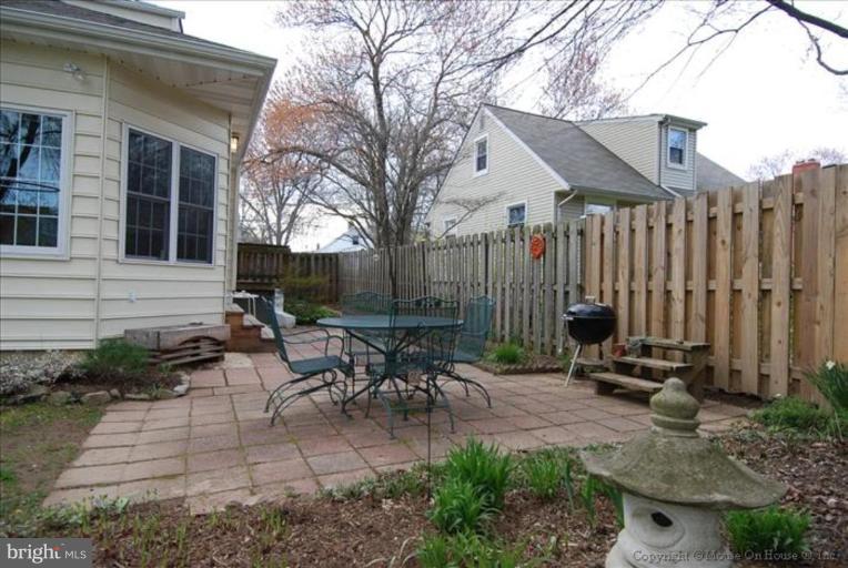 10403 Procter Street Silver Spring, MD 20901 - Photo 11 of 11 a view of backyard with patio and outdoor seating