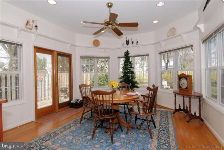 10403 Procter Street Silver Spring, MD 20901 - Photo 3 of 11 a view of a dining room with furniture window and wooden floor