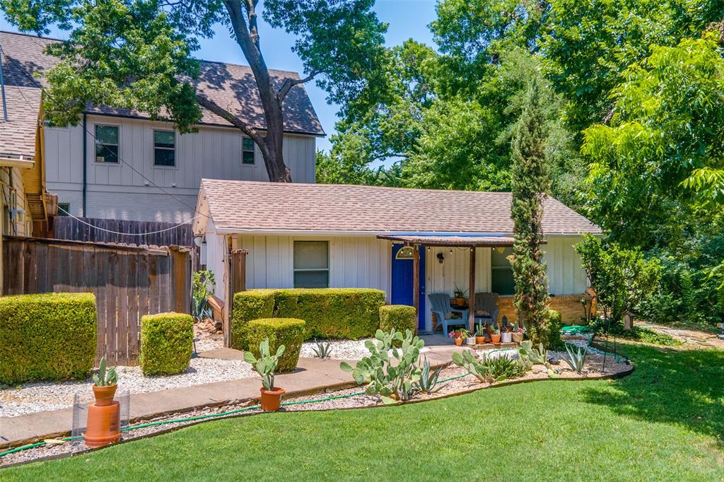 800 Harter Road Dallas, TX 75218 - Photo 13 of 17 View of front of home with a shingled roof and covered porch