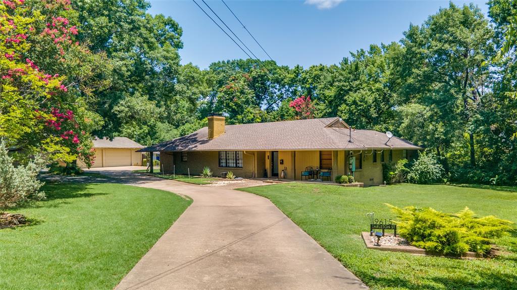 800 Harter Road Dallas, TX 75218 - Photo 4 of 17 View of front of home featuring a front yard, a chimney, and brick siding