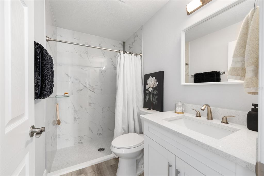 3597 Southwest 151st Avenue Ocala, FL 34481 - Photo 20 of 35 a bathroom with a sink toilet and shower