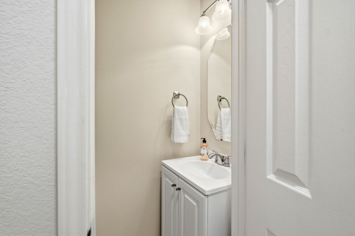 1900 Scofield Ridge Parkway, Unit 203 Austin, TX 78727 - Photo 23 of 31 Half bathroom with vanity