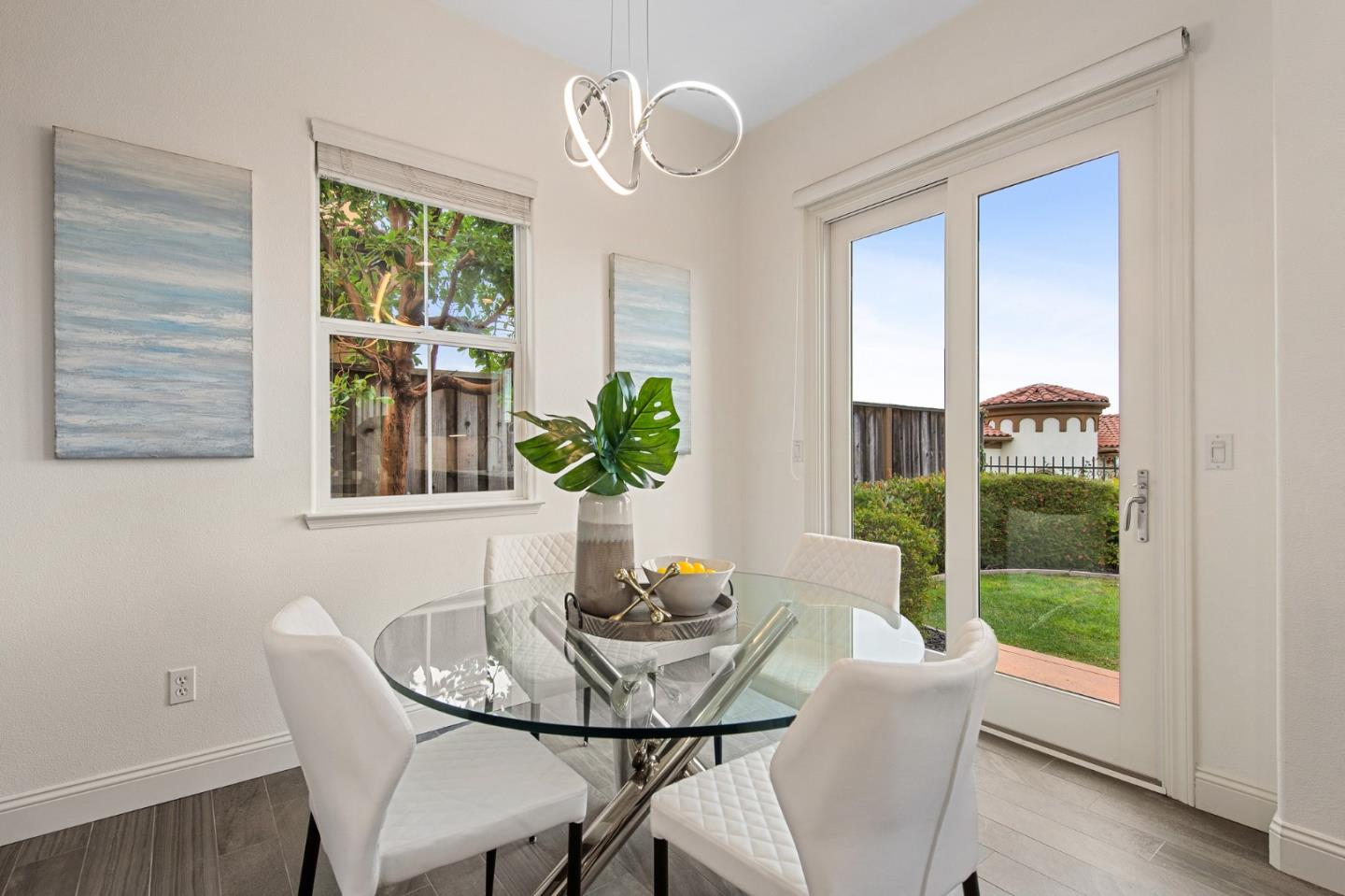 9 Estates Drive Millbrae, CA 94030 - Photo 20 of 52 a view of a dining room with furniture window and wooden floor