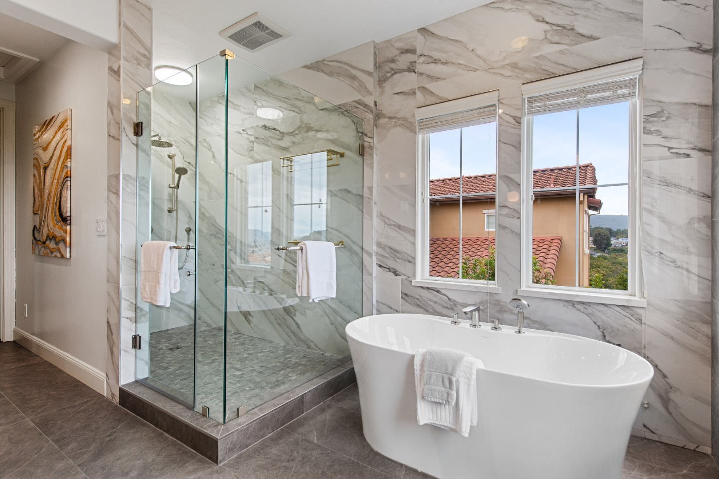 9 Estates Drive Millbrae, CA 94030 - Photo 30 of 52 a spacious bathroom with a tub shower and mirror