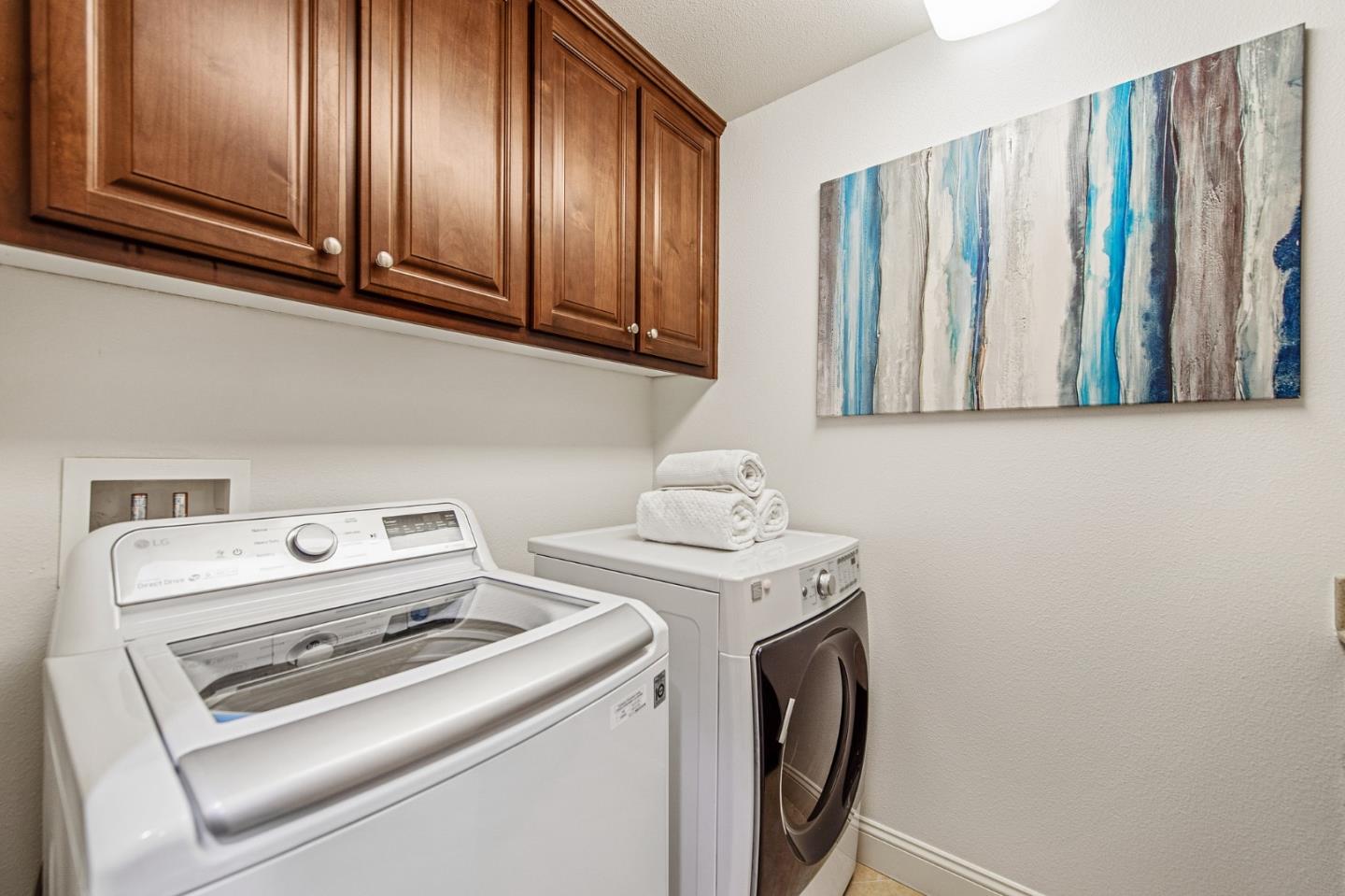 9 Estates Drive Millbrae, CA 94030 - Photo 42 of 52 a utility room with dryer and washer