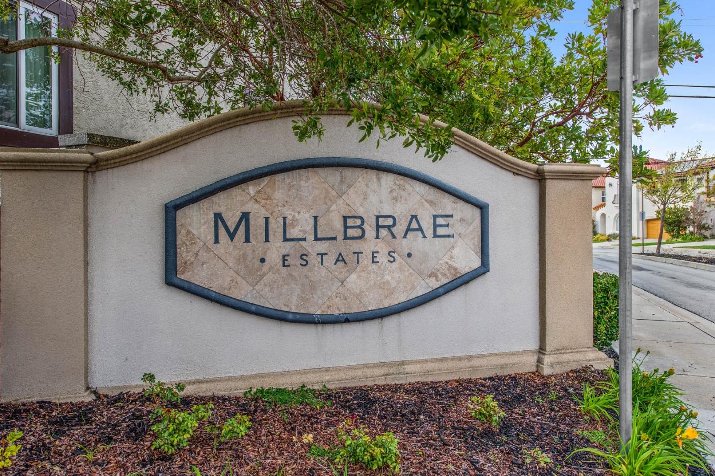 9 Estates Drive Millbrae, CA 94030 - Photo 52 of 52 a sign on the side of a building