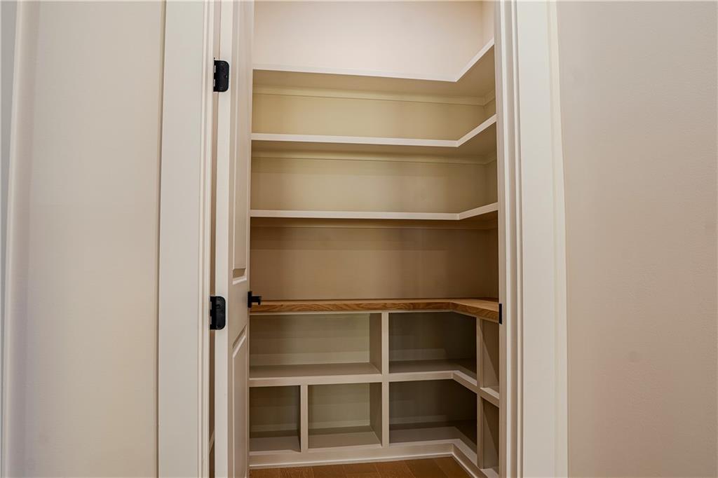 2210 Ridgedale Drive Southwest Grayson, GA 30017 - Photo 11 of 74 a view of walk in closet with empty racks