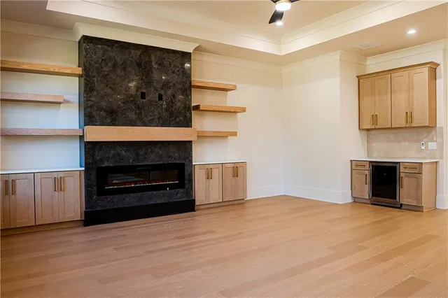 a bathroom with a glass door shower and a sink