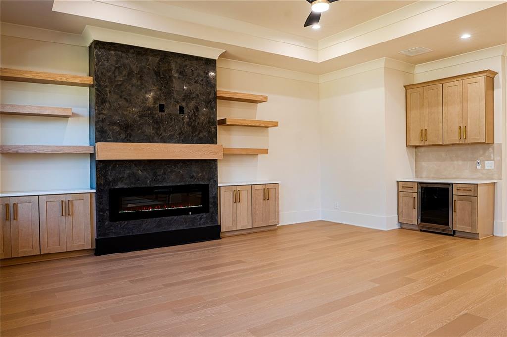 2210 Ridgedale Drive Southwest Grayson, GA 30017 - Photo 40 of 74 a view of a livingroom with a fireplace and cabinet