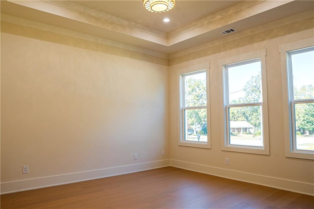 2210 Ridgedale Drive Southwest Grayson, GA 30017 - Photo 45 of 74 wooden floor in an empty room with a window