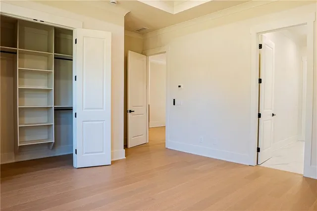 a kitchen with stainless steel appliances a stove and a refrigerator