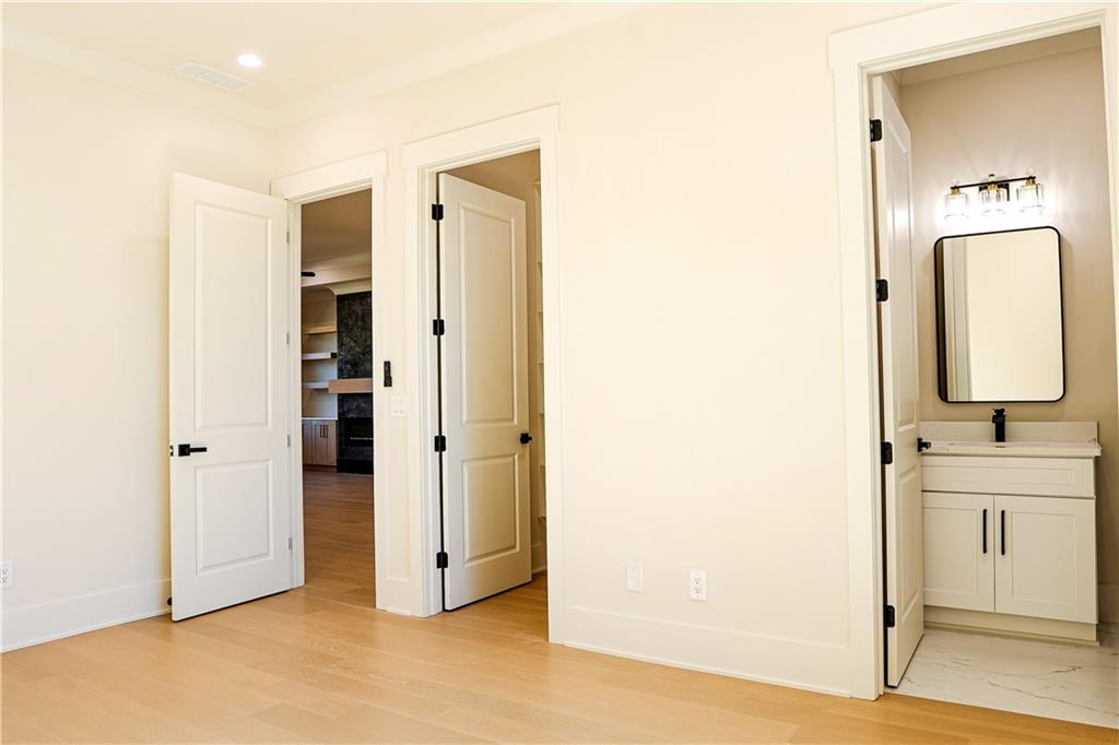 2210 Ridgedale Drive Southwest Grayson, GA 30017 - Photo 54 of 74 a view of a bathroom from a hallway