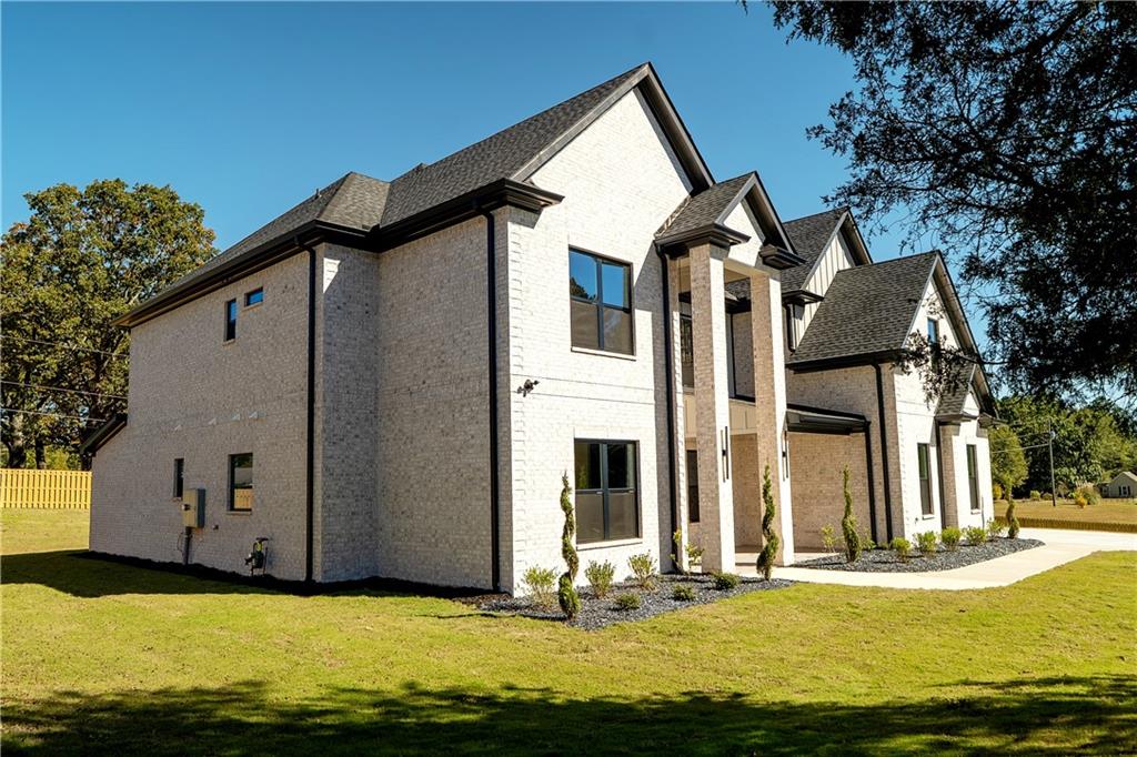 2210 Ridgedale Drive Southwest Grayson, GA 30017 - Photo 70 of 74 a front view of house with yard