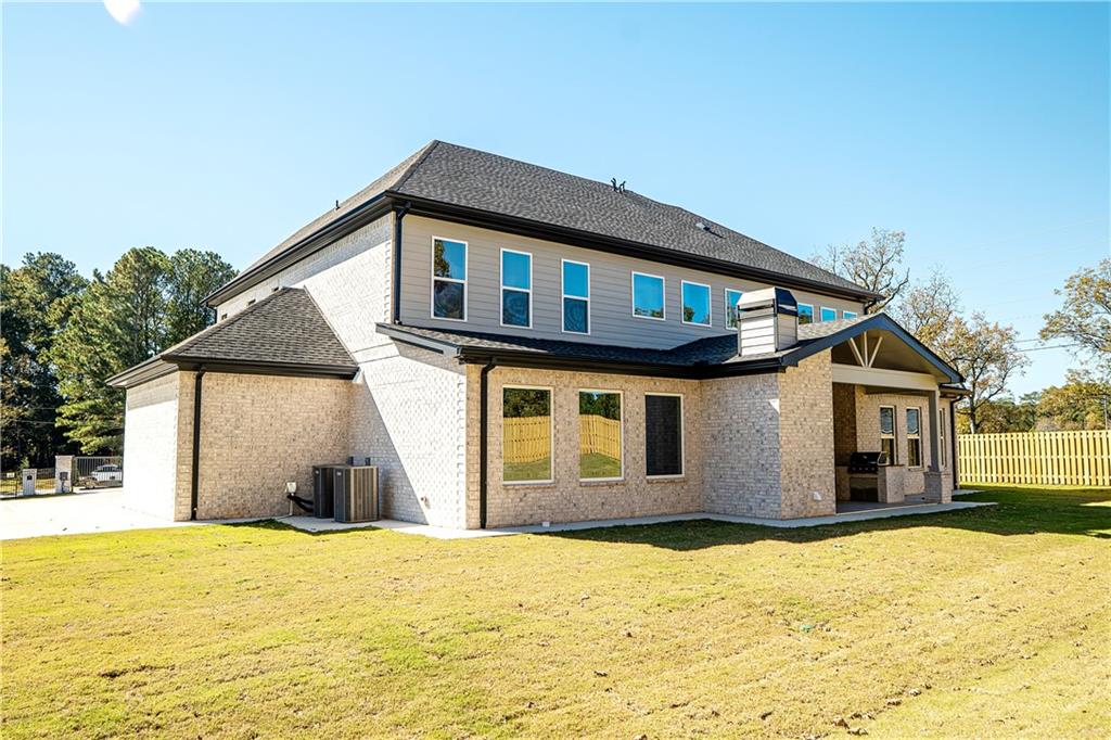 2210 Ridgedale Drive Southwest Grayson, GA 30017 - Photo 72 of 74 a house with a outdoor space