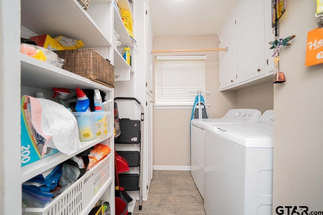 607 Green Oak Drive Longview, TX 75604 - Photo 15 of 48 a utility room with dryer and washer