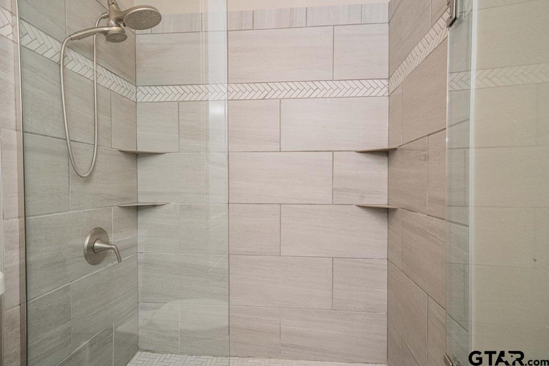 607 Green Oak Drive Longview, TX 75604 - Photo 24 of 48 a bathroom with a shower
