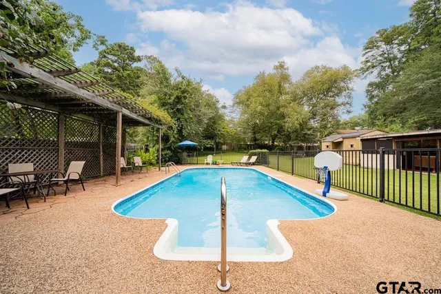 a view of outdoor space yard swimming pool and patio