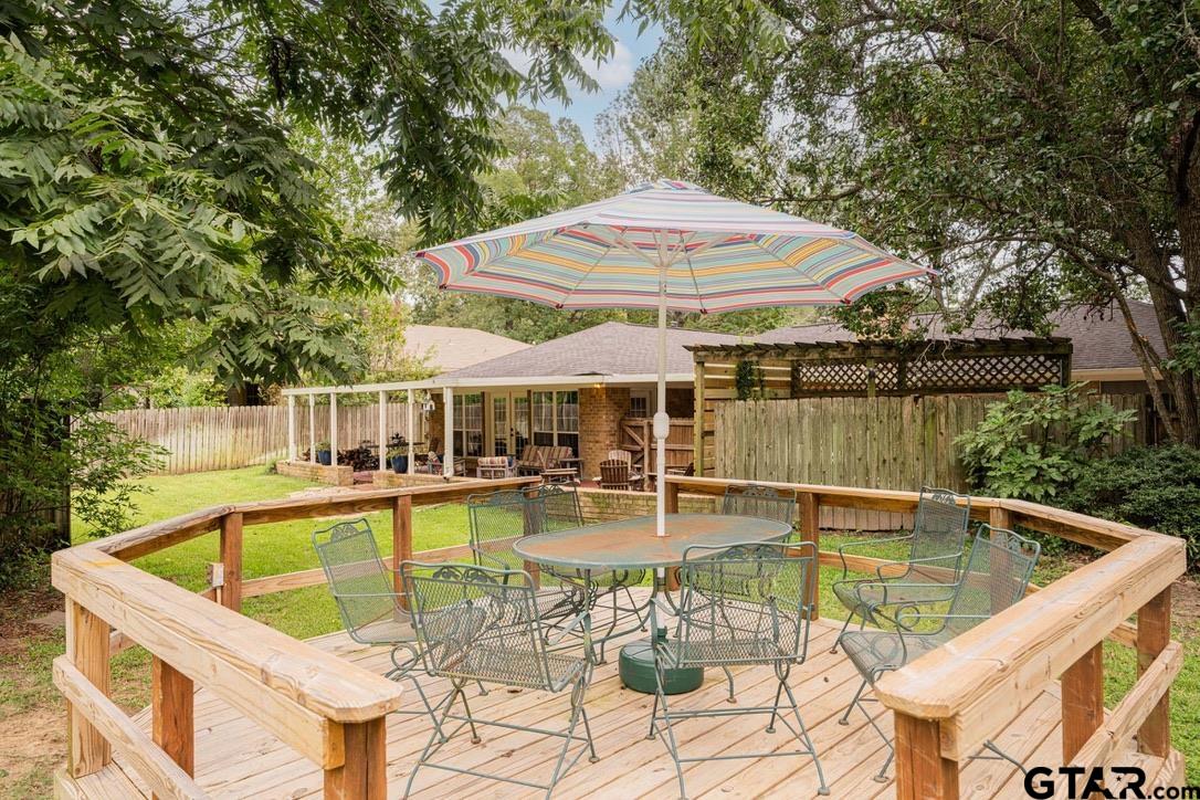 607 Green Oak Drive Longview, TX 75604 - Photo 34 of 48 swimming pool view with a seating space