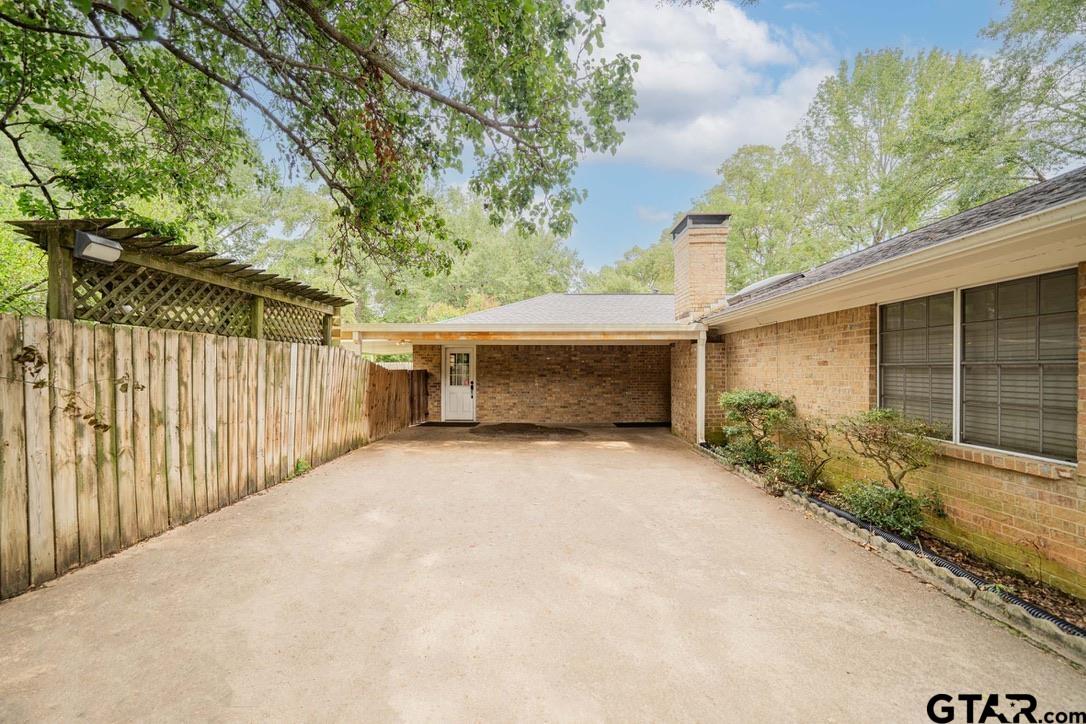 607 Green Oak Drive Longview, TX 75604 - Photo 42 of 48 a view of backyard and porch