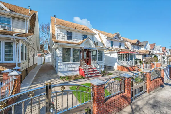 a front view of house with large windows