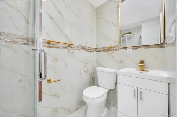 a bathroom with a sink and a toilet