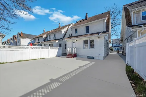 a house view with a street