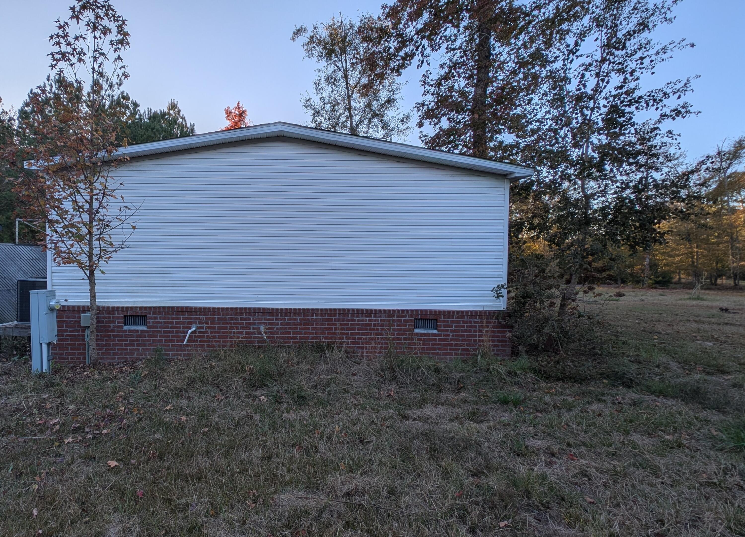 1563 Highway 311 Cross, SC 29436 - Photo 29 of 33 Left side of property