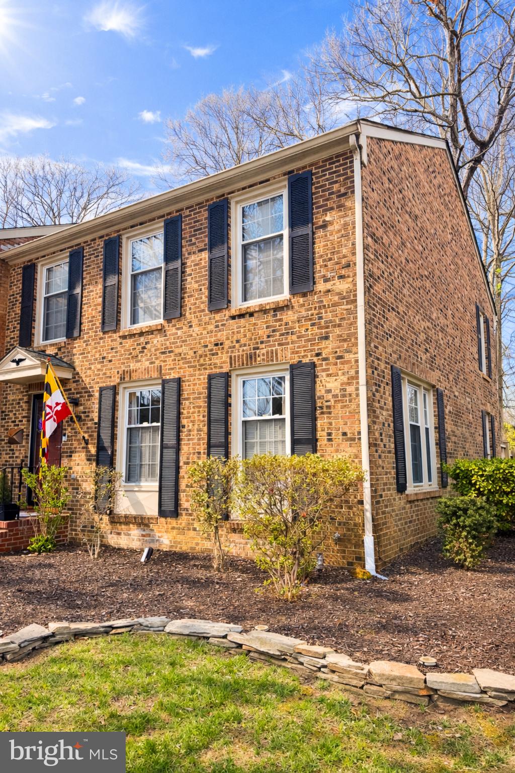 1713 Dryden Way Crofton, MD 21114 - Photo 2 of 2 a front view of a house with a yard garage and outdoor seating
