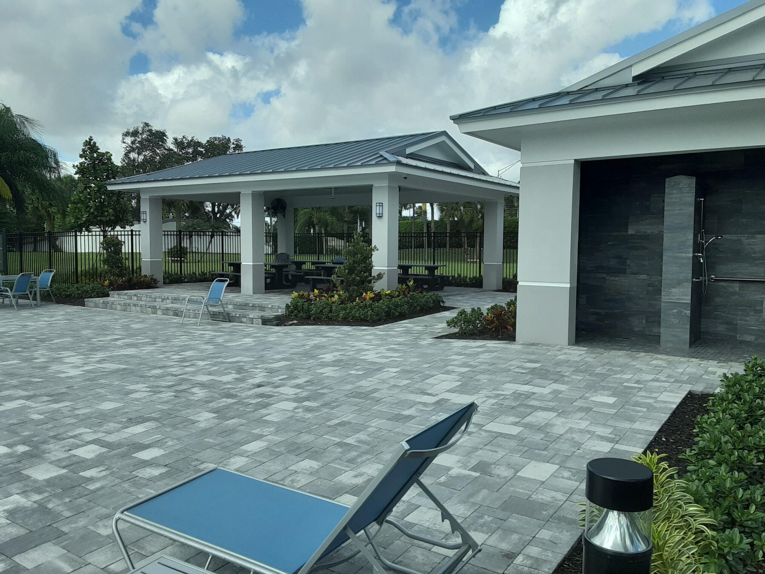 19620 Hampton Drive Boca Raton, FL 33434 - Photo 43 of 45 a view of a house with backyard and sitting area
