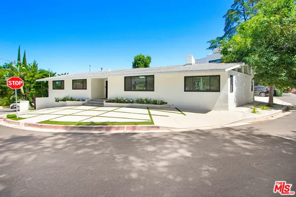 a view of a house with a swimming pool