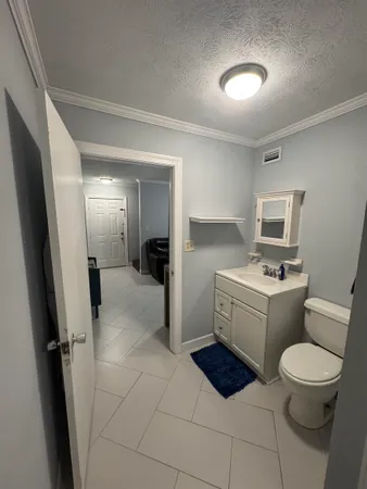 a room with furniture and a wooden floor