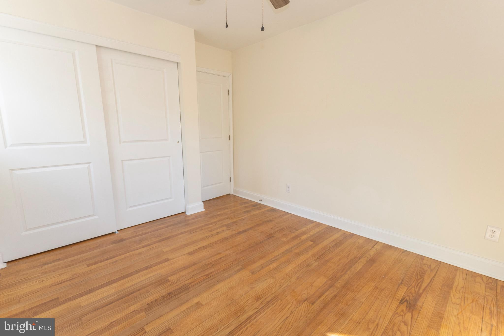 49151 Wynne Road Ridge, MD 20680 - Photo 43 of 80 Bright and airy bedroom with hardwood floors.