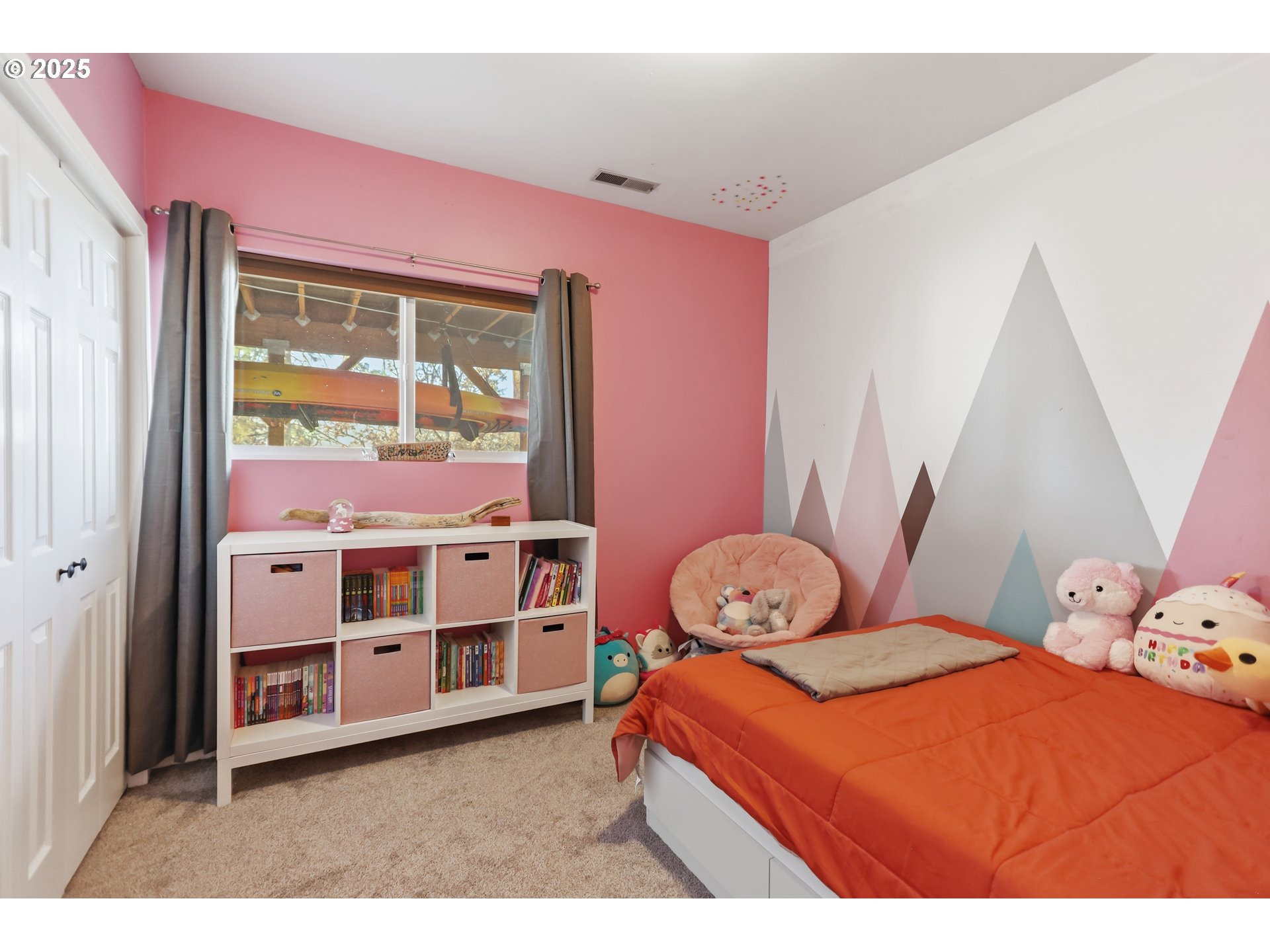 522 West 22nd Street The Dalles, OR 97058 - Photo 11 of 26 a bedroom with a bed and a window