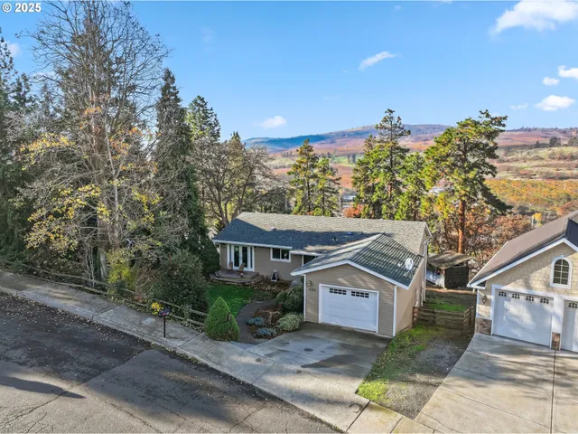 a hallway with a sink and a mirror