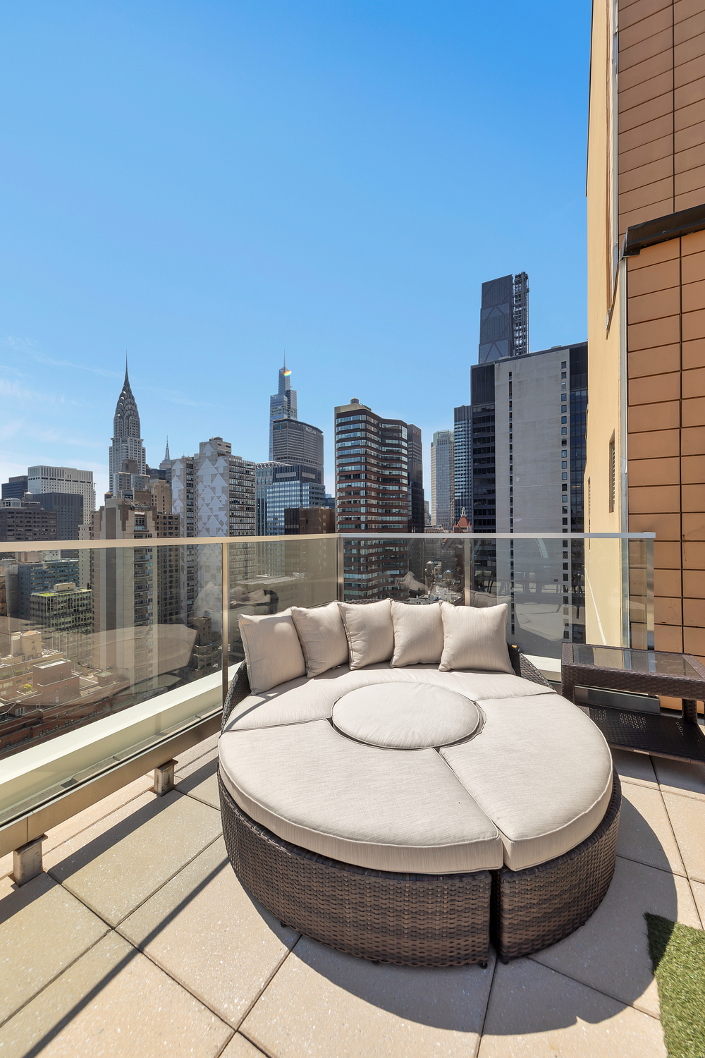 250 East 49th Street, Unit 3E Manhattan, NY 10017 - Photo 18 of 20 a view of a city from a terrace