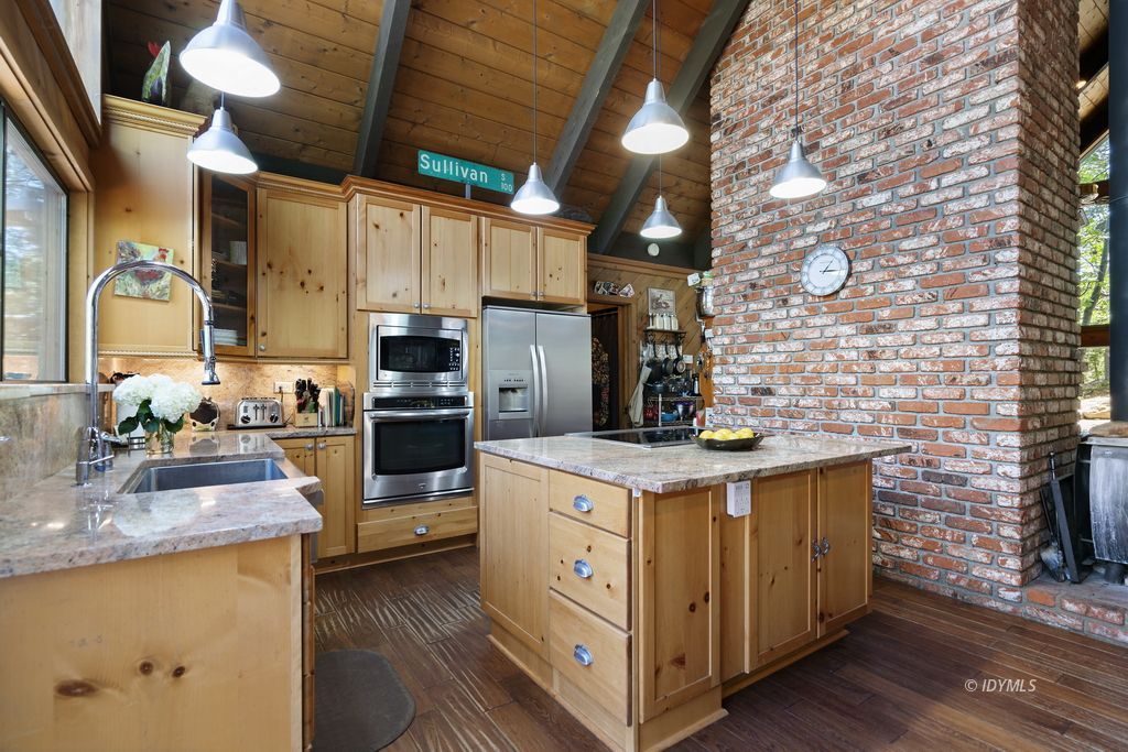25575 Sunrise Drive Idyllwild, CA 92549 - Photo 11 of 35 a kitchen with a stove and a refrigerator