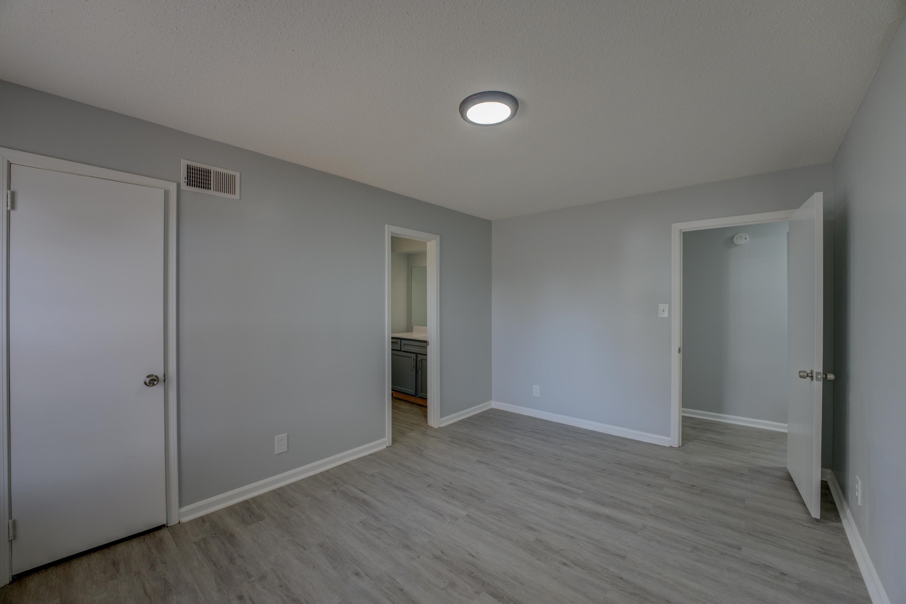 3482 Clarke Road Memphis, TN 38115 - Photo 17 of 29 a view of an empty room with wooden floor