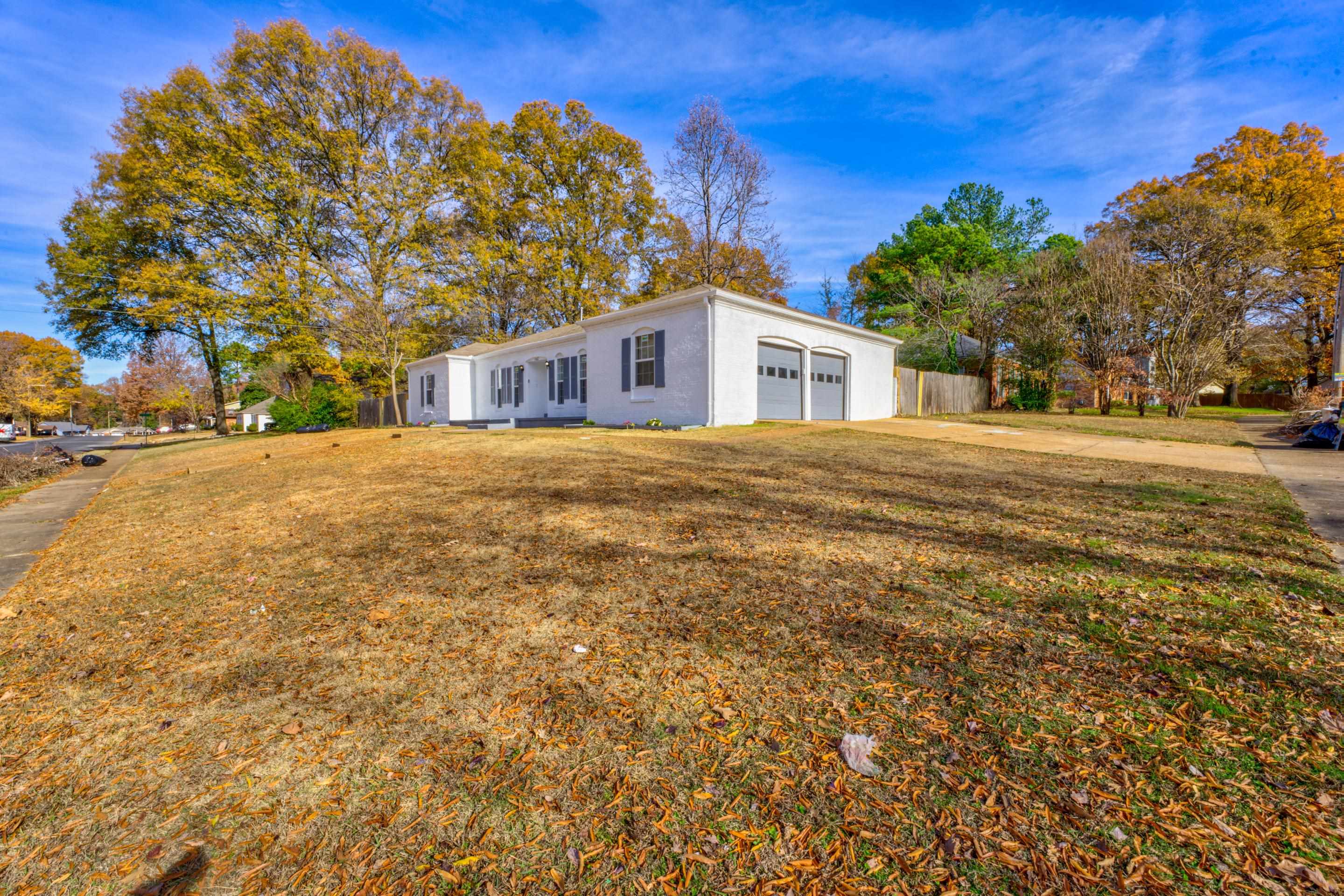 3482 Clarke Road Memphis, TN 38115 - Photo 28 of 29 a front view of a house with a yard