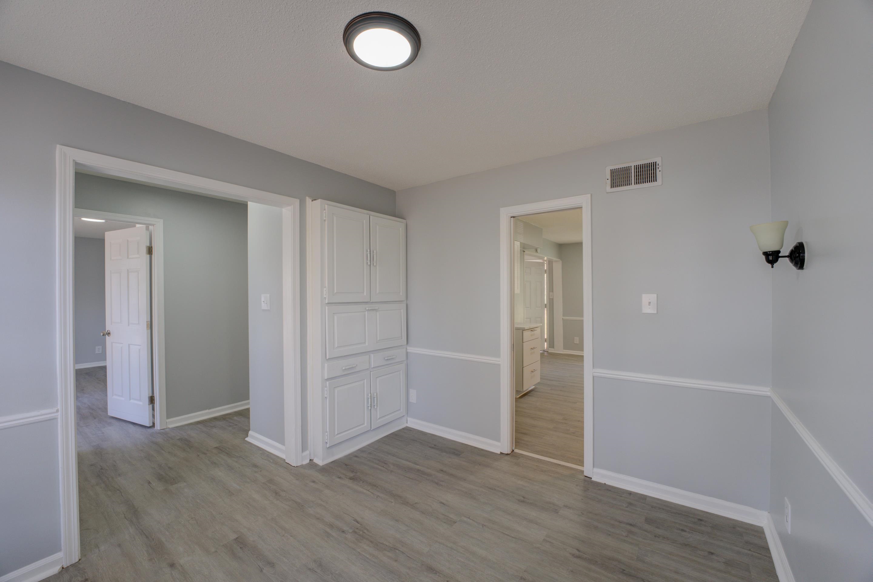 3482 Clarke Road Memphis, TN 38115 - Photo 8 of 29 an empty room with wooden floor and closet