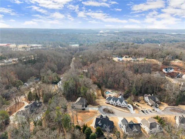 a view of swimming pool with trees