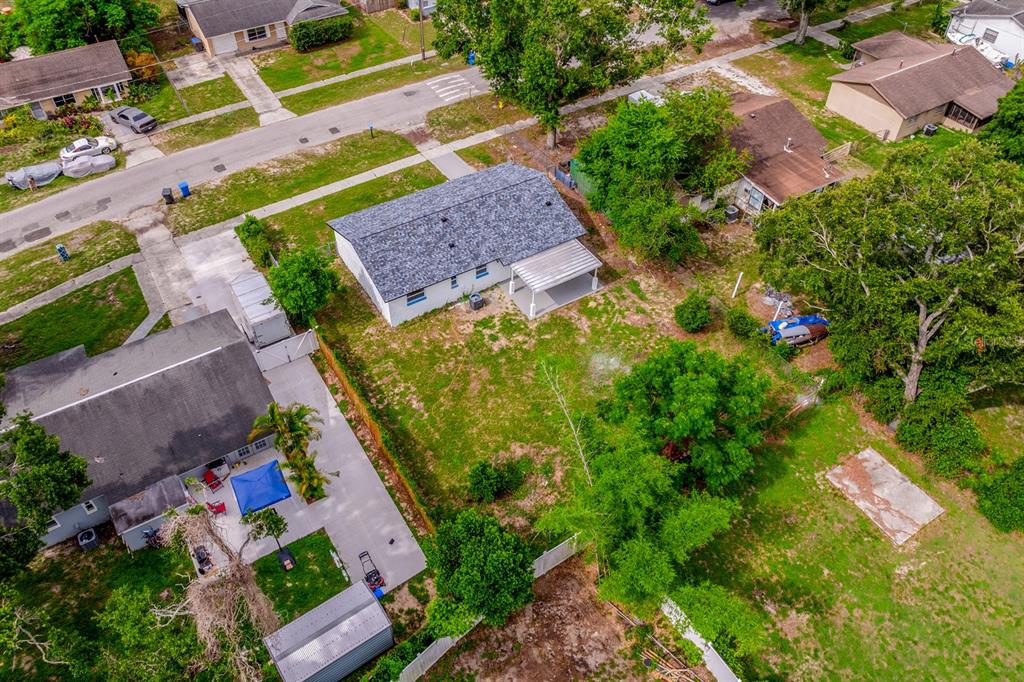 109 Magnolia Avenue Seffner, FL 33584 - Photo 14 of 46 an aerial view of a house with a yard