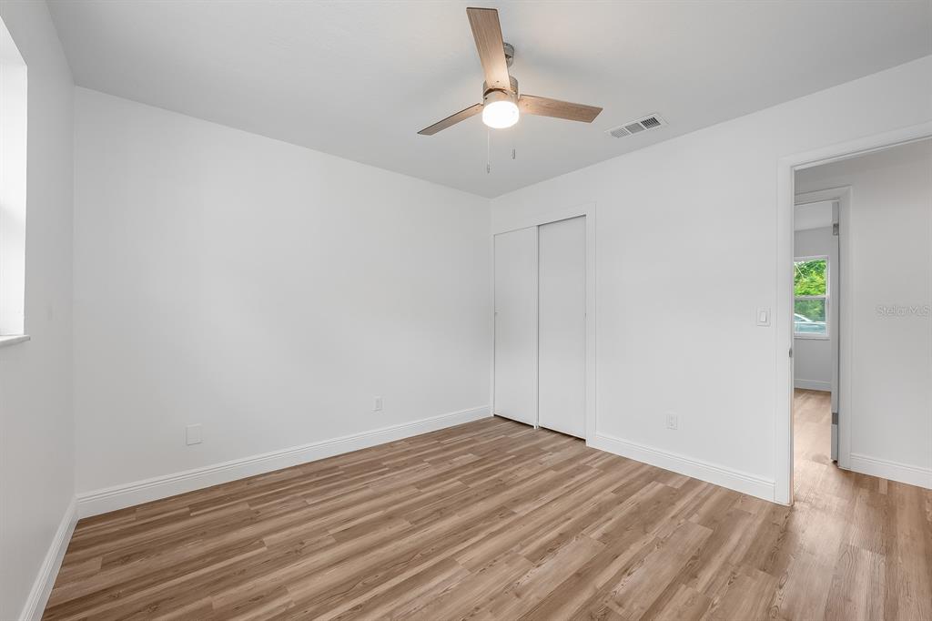 109 Magnolia Avenue Seffner, FL 33584 - Photo 46 of 46 a view of empty room with wooden floor
