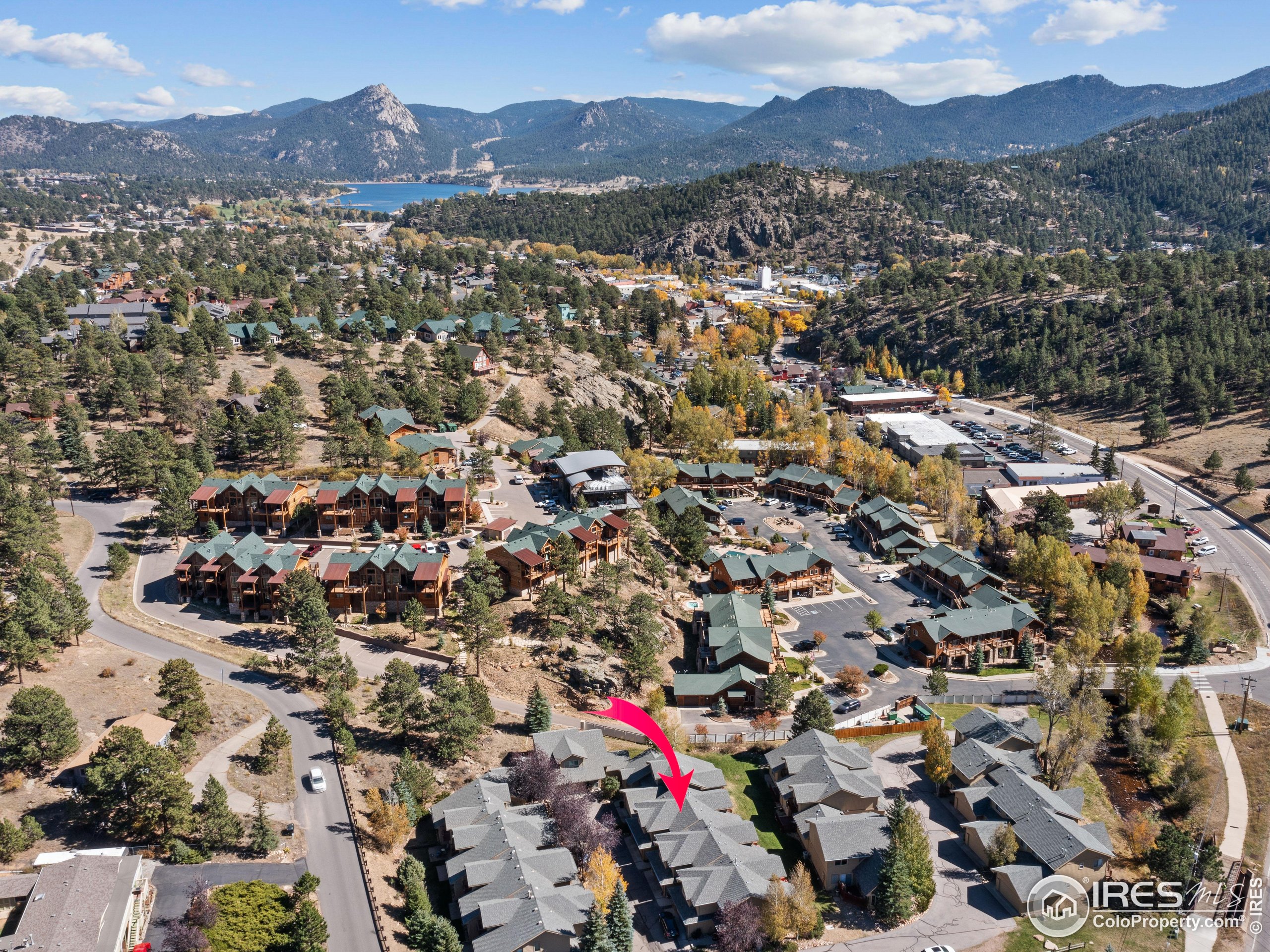 300 Far View Drive, Unit 7 Estes Park, CO 80517 - Photo 13 of 26 an aerial view of residential house with parking and mountain view