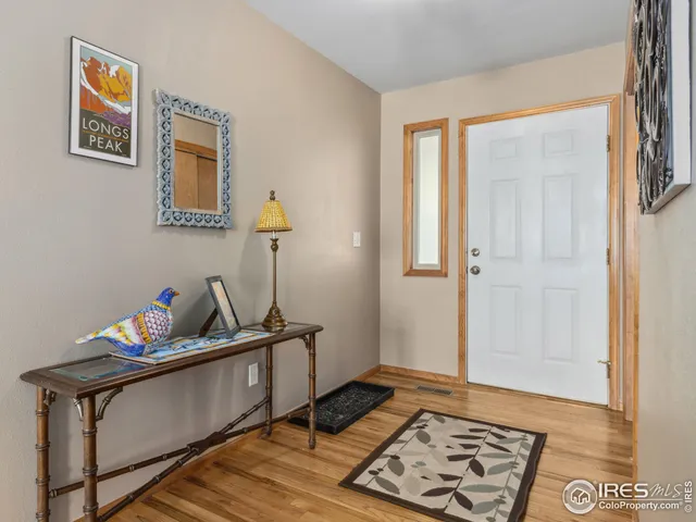 a room with furniture and wooden floor