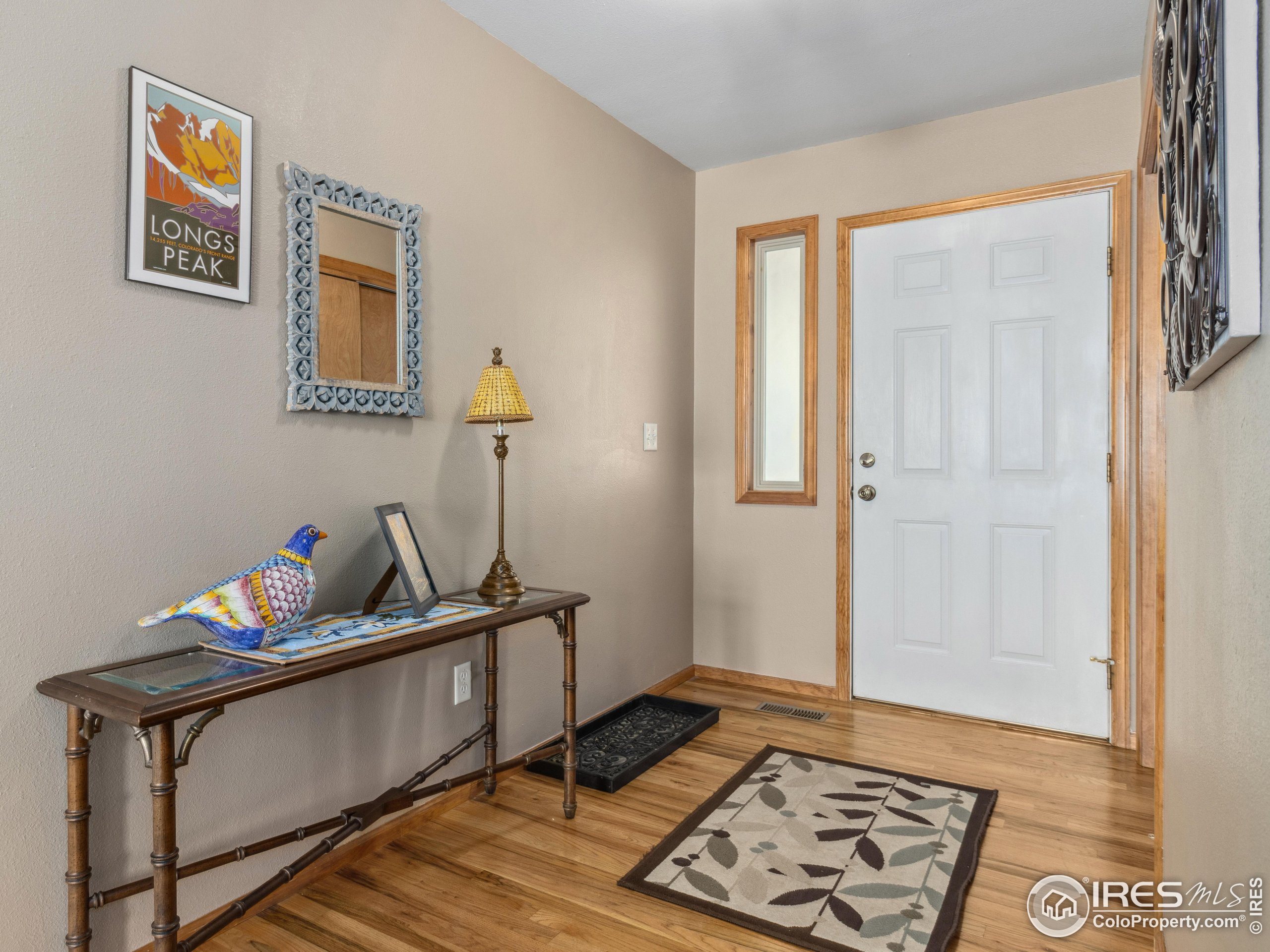 300 Far View Drive, Unit 7 Estes Park, CO 80517 - Photo 3 of 26 a room with furniture and wooden floor